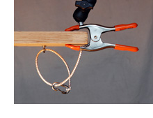 nclamp with tether and breech clip
