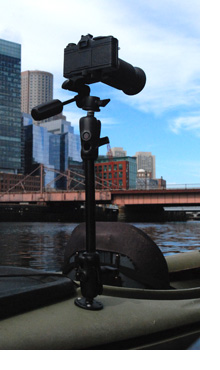 Surfpole on kayak near Atlantic Wharf, Boston.